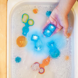 Glo pals - Lichtgevende sensorische kubussen voor in bad of sensorisch spel + Poppetje - Cookie